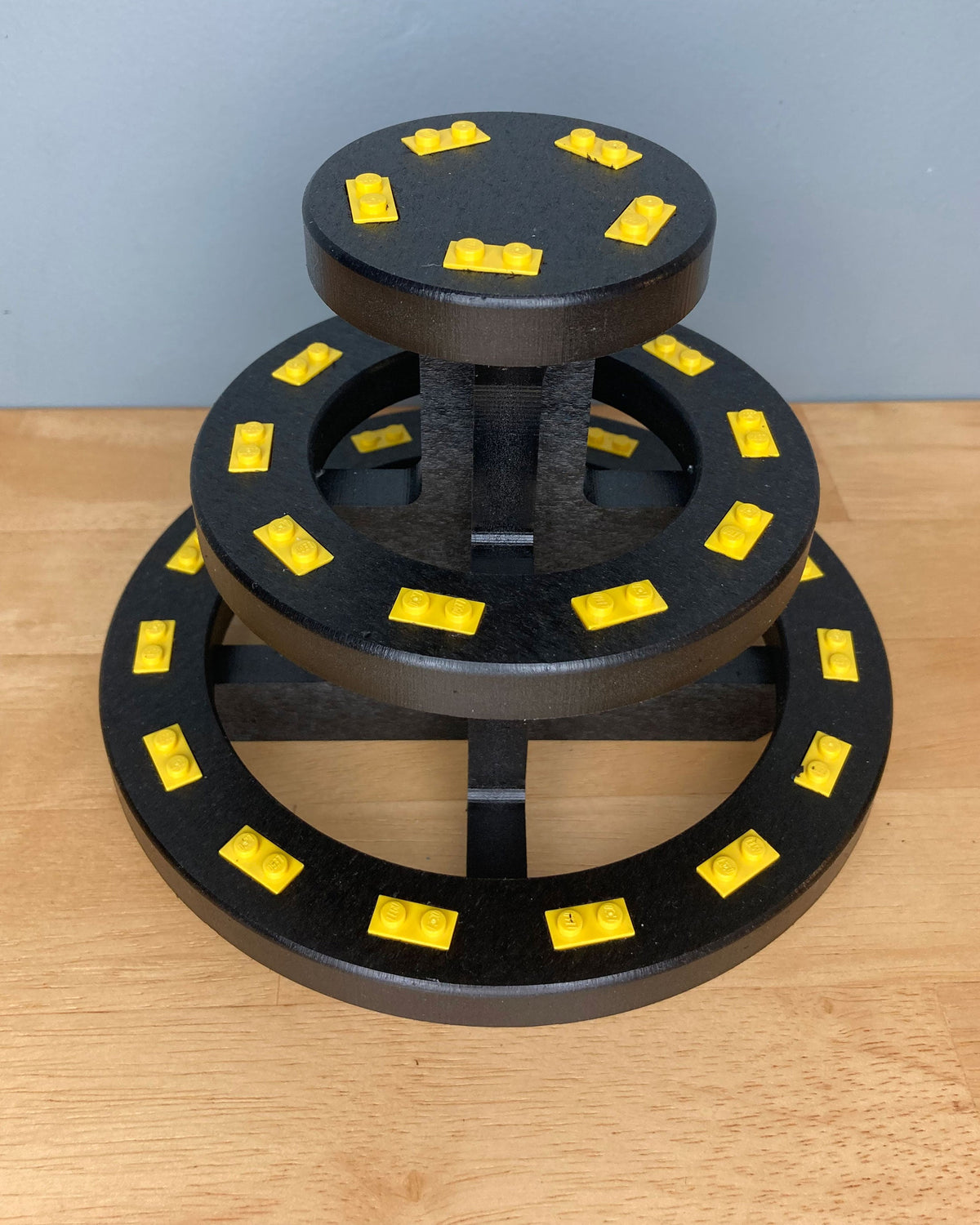 Round 3-Tier Display Stand (Assorted Brick Colors) product image 1, provided for visual reference and product detail review